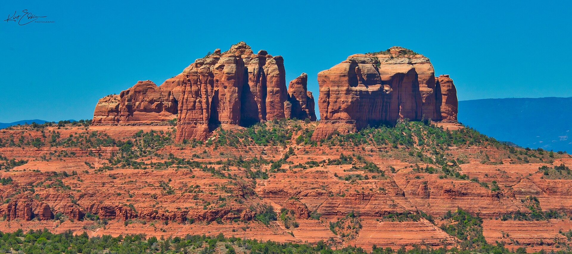 Cathedral Rock in Sedona, Arizona, red sandstone spires under a clear blue sky