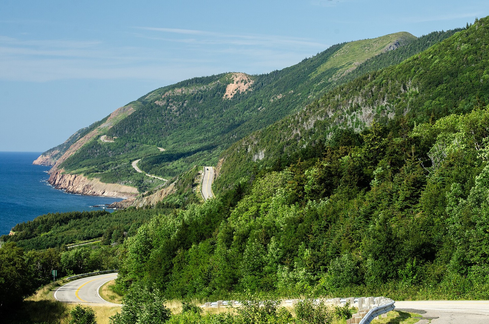 The Cabot Trail road winding along the coast of Cape Breton Highlands National Park, Nova Scotia