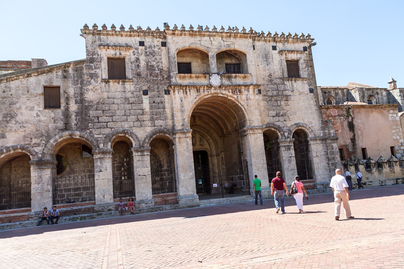 Stone arcades and paved square in the Zona Colonial of Santo Domingo, Dominican Republic