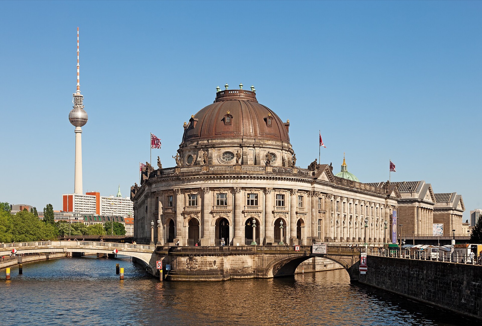 The Bode Museum on Museum Island in Berlin with the Fernsehturm television tower behind it on a clear day