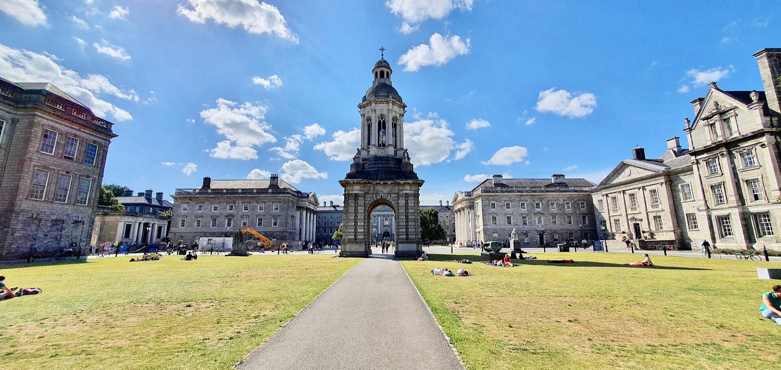 The main square of Trinity College Dublin with its campanile and stone buildings