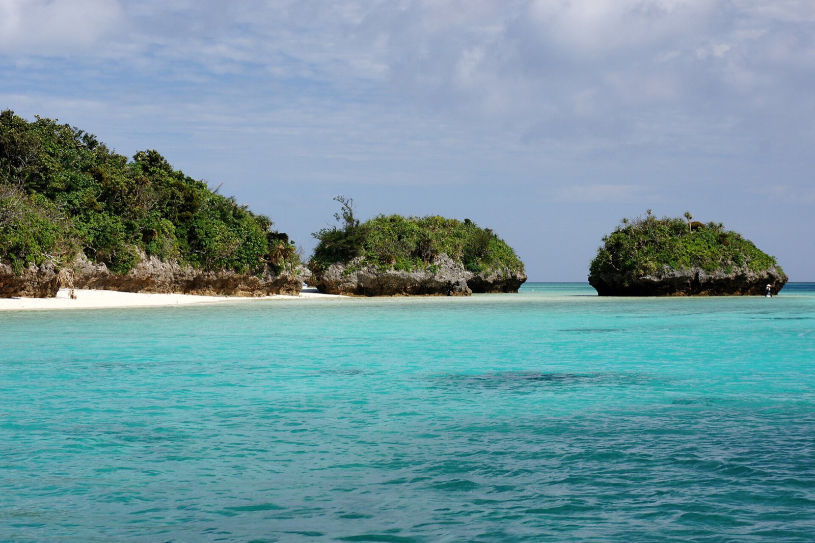 Turquoise lagoon water and small wooded islets at Kabira Bay on Ishigaki island, Okinawa