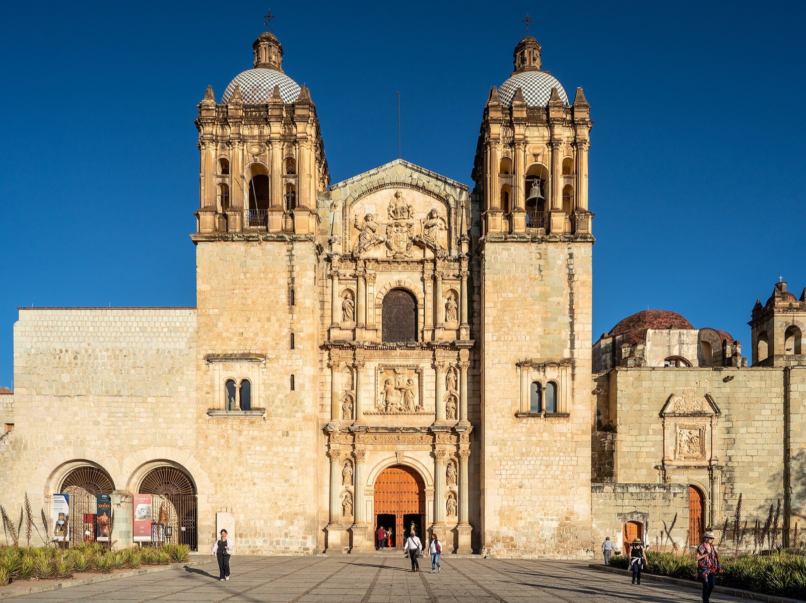 The baroque facade of the Templo de Santo Domingo de Guzman in Oaxaca de Juarez under a blue sky