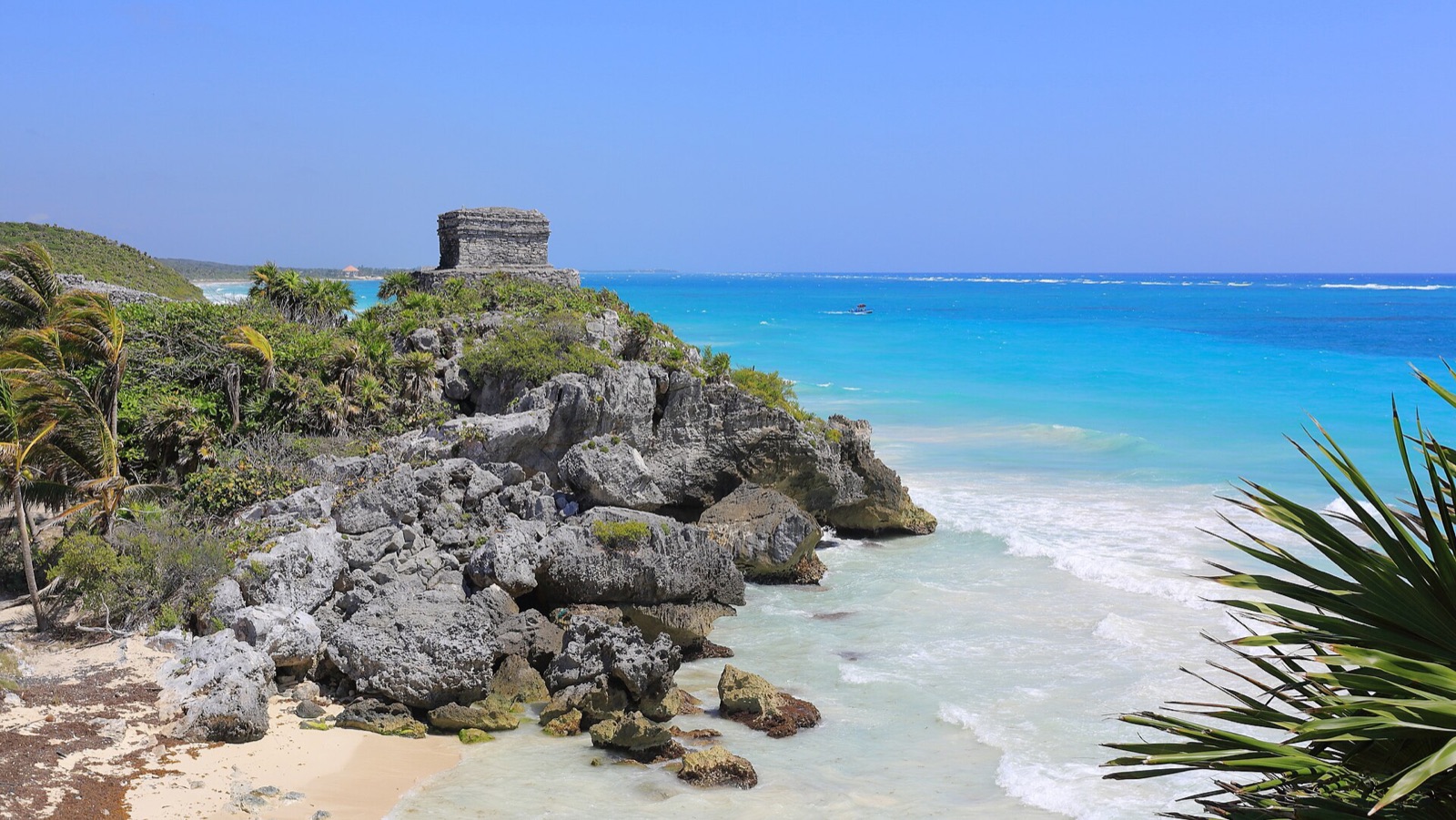 The Caribbean shore below the Maya site of Tulum, Quintana Roo, with turquoise water and white sand