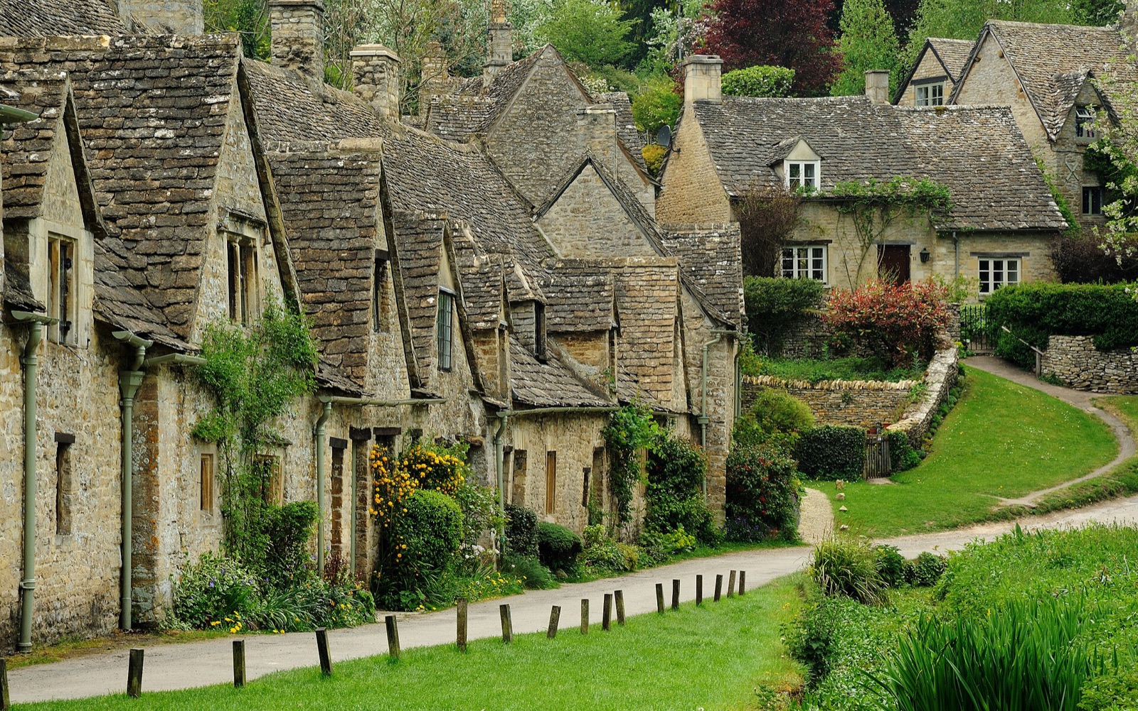 Arlington Row, a line of stone cottages in Bibury in the Cotswolds, England